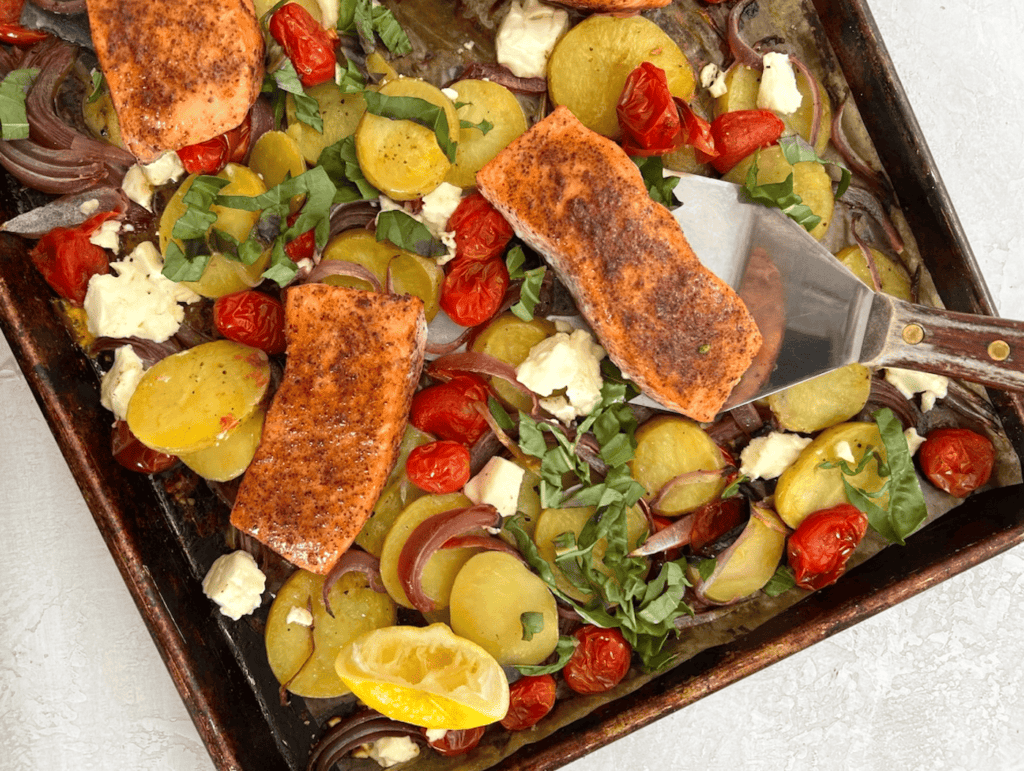 Sheet pan salmon with tomatoes and feta