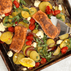 Sheet pan salmon with tomatoes and feta