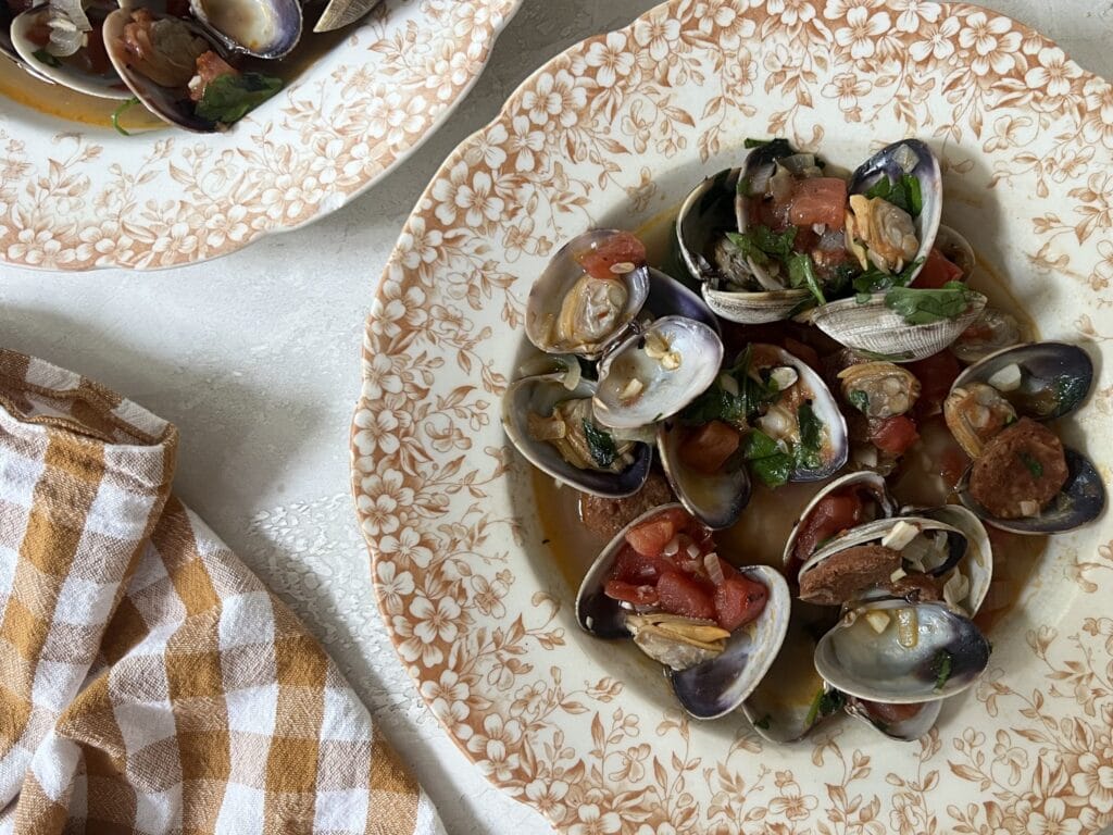 brothy clams with chorizo and tomatoes